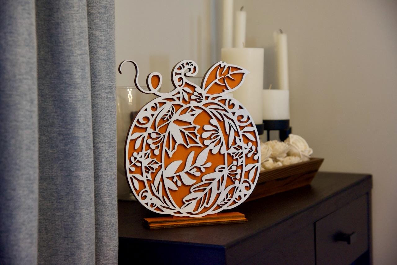 Wooden pumpking decoration. Beautifully crafted ornamental design.