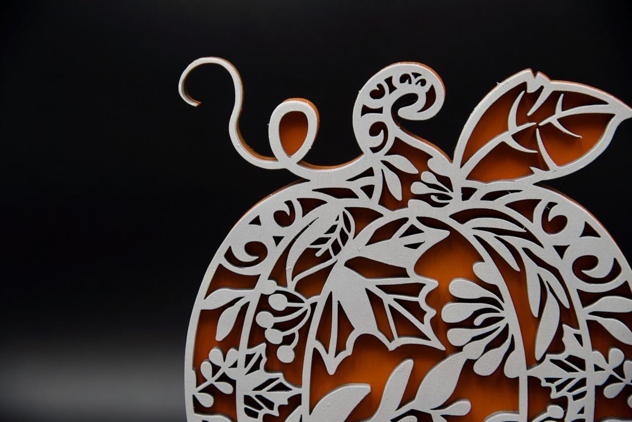 Wooden pumpking decoration. Beautifully crafted ornamental design.