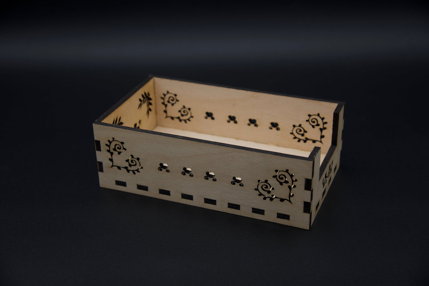 Wooden napkin holder. Beautifully crafted ornamental design.