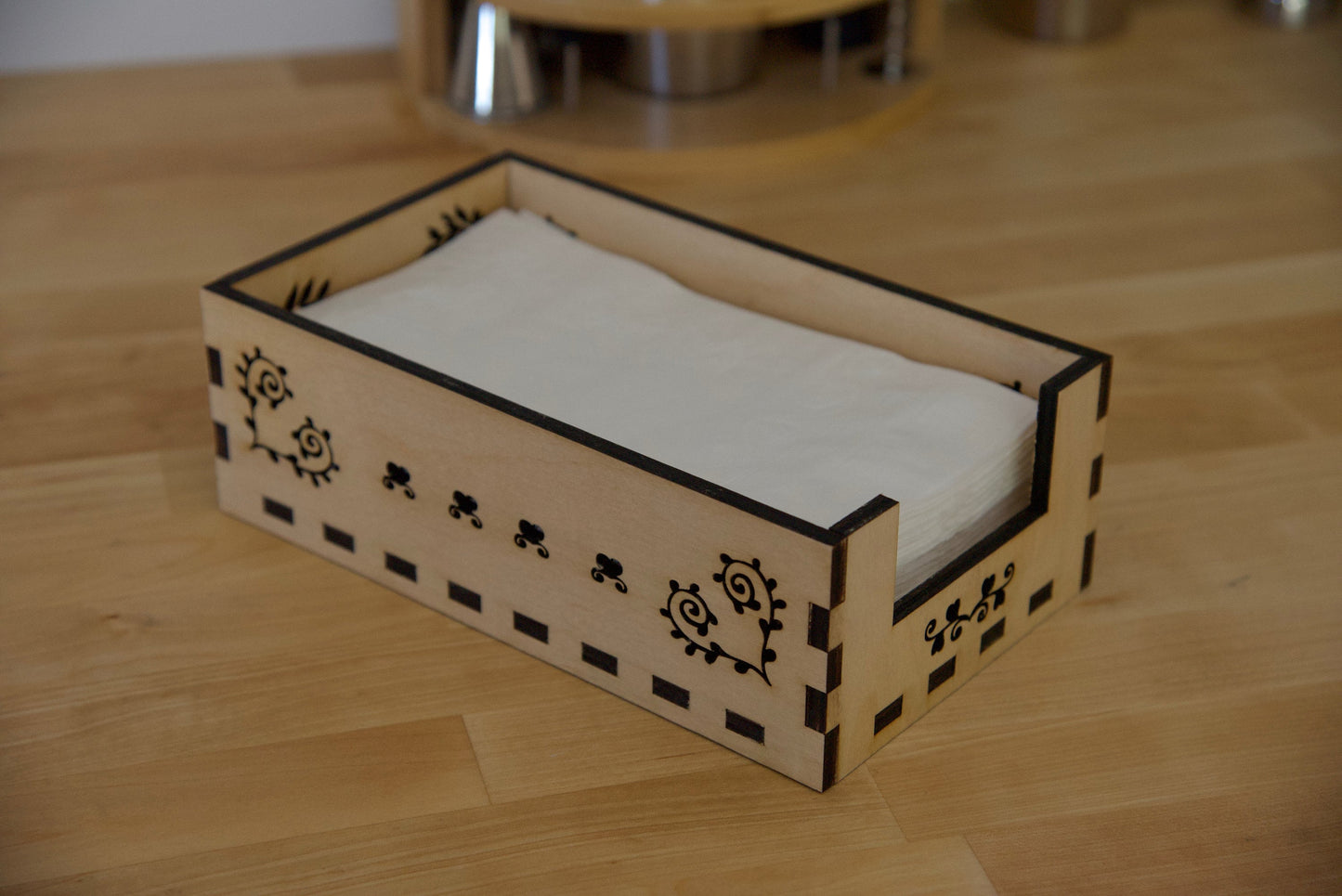 Wooden napkin holder. Beautifully crafted ornamental design.